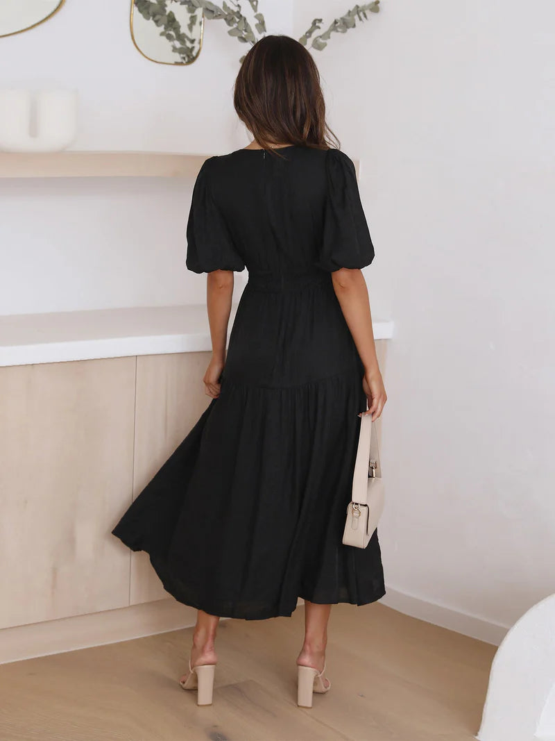 Ella - Vestido con cuello en V y mangas abullonadas