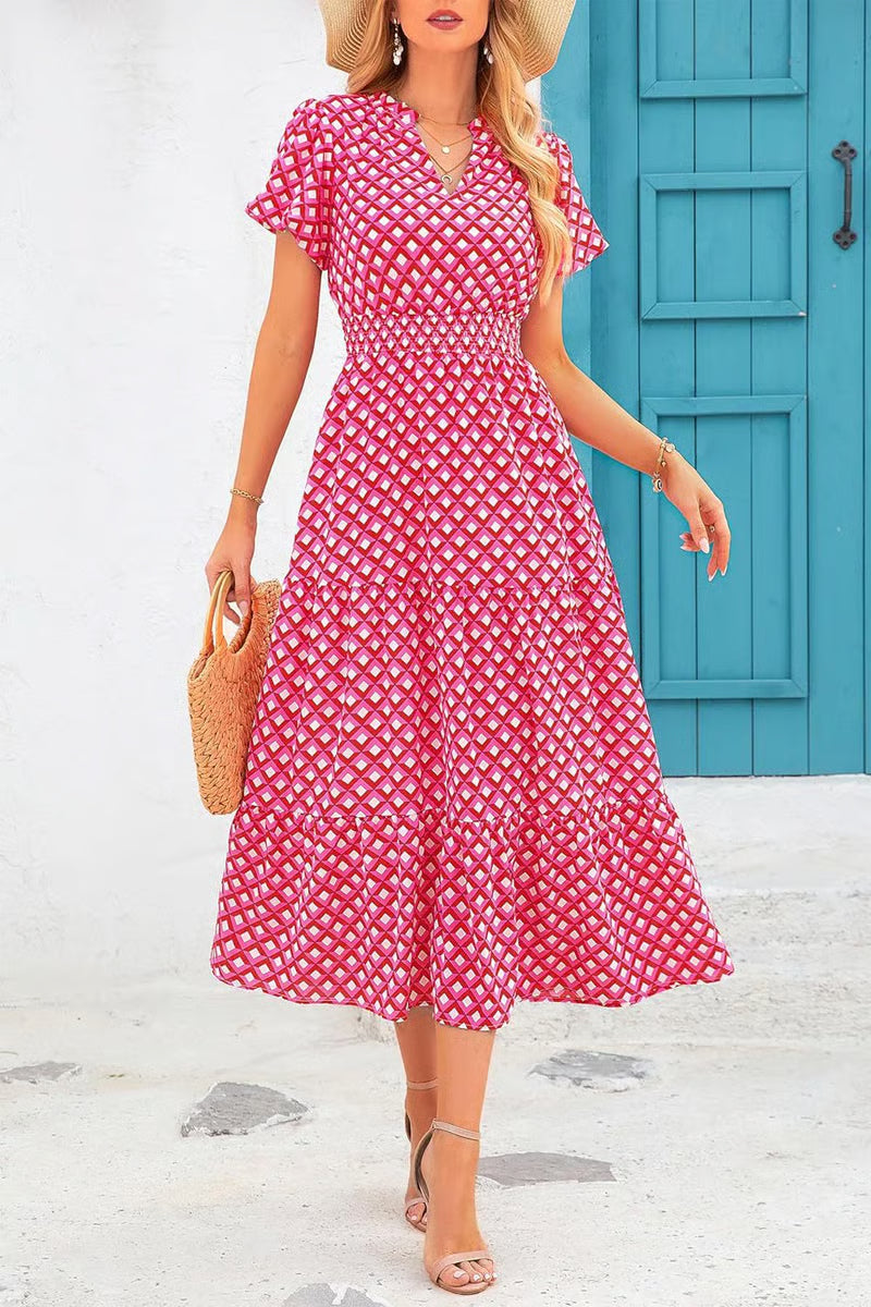 Mila - Vestido midi floral con cuello en V