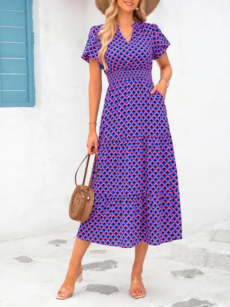 Mila - Vestido midi floral con cuello en V