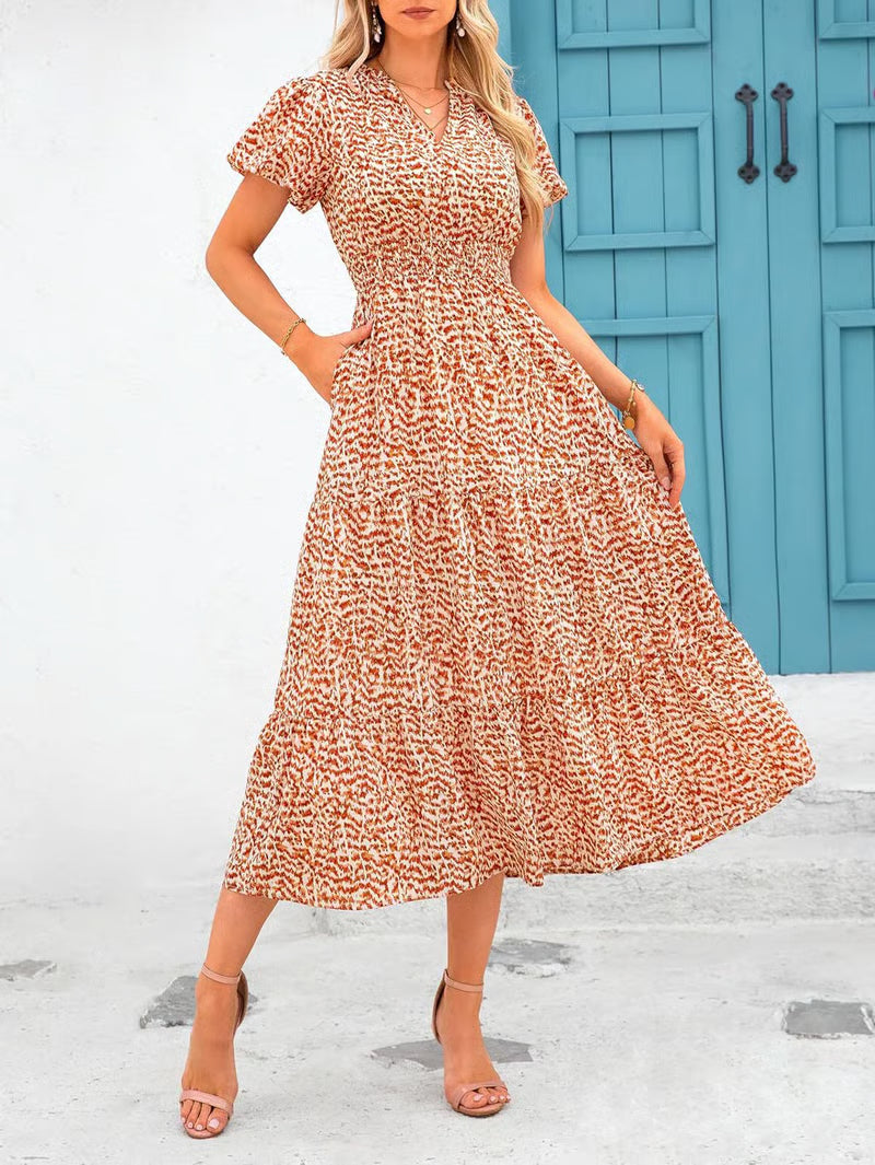 Mila - Vestido midi floral con cuello en V
