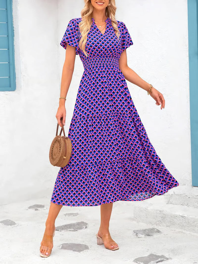 Mila - Vestido midi floral con cuello en V