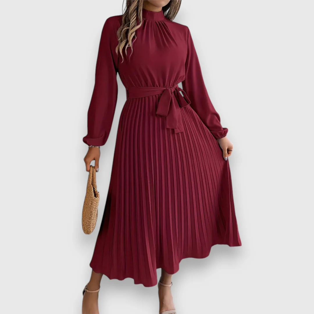 Valeria™ – Vestido midi plisado con lazo y cuello alto
