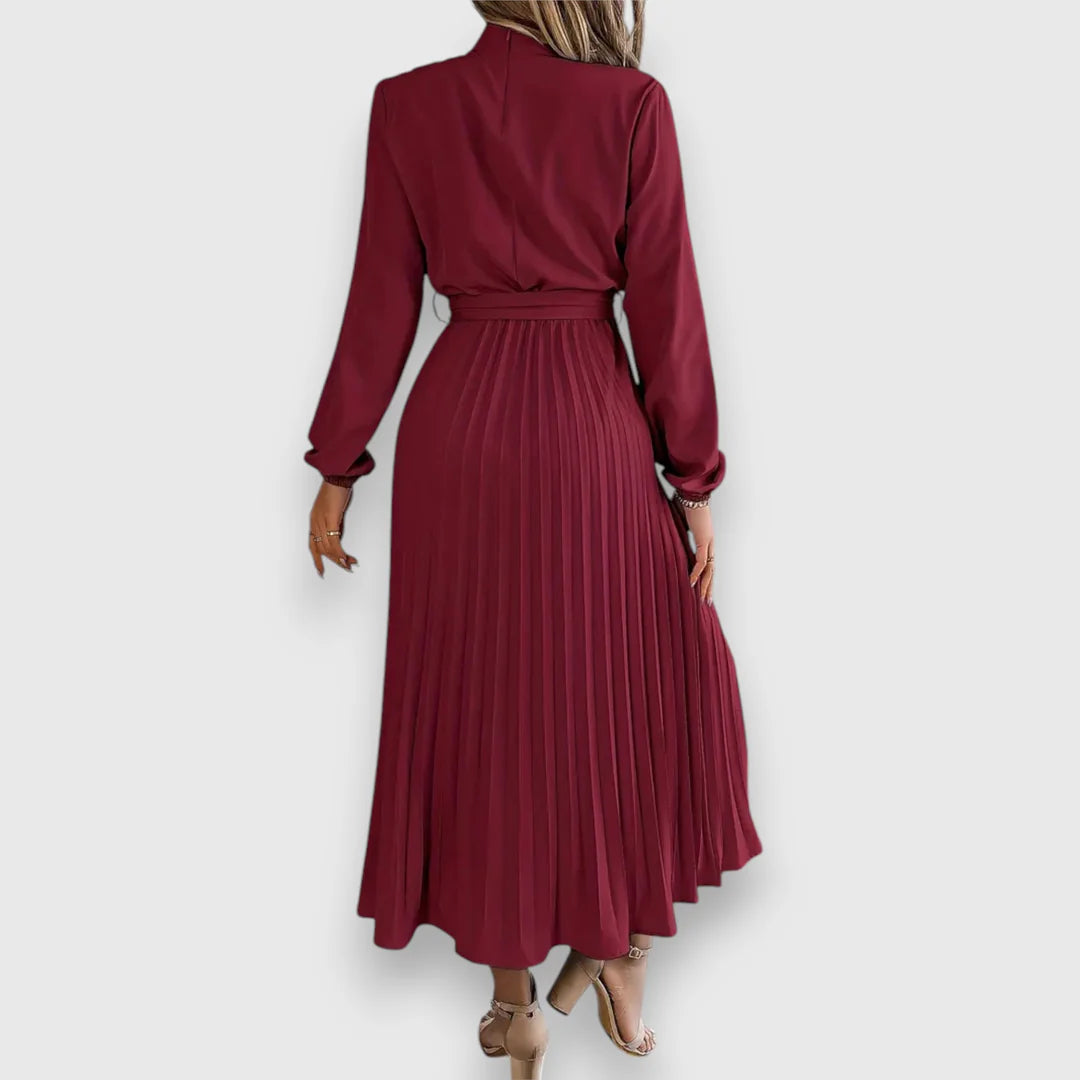 Valeria™ – Vestido midi plisado con lazo y cuello alto