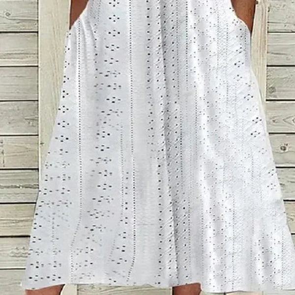 Abril™ | El vestido bordado que respira verano