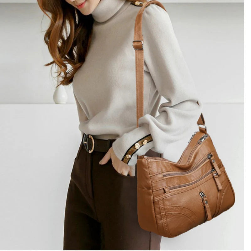 Clara - Bolso bandolera moderno con múltiples cremalleras y correa ajustable