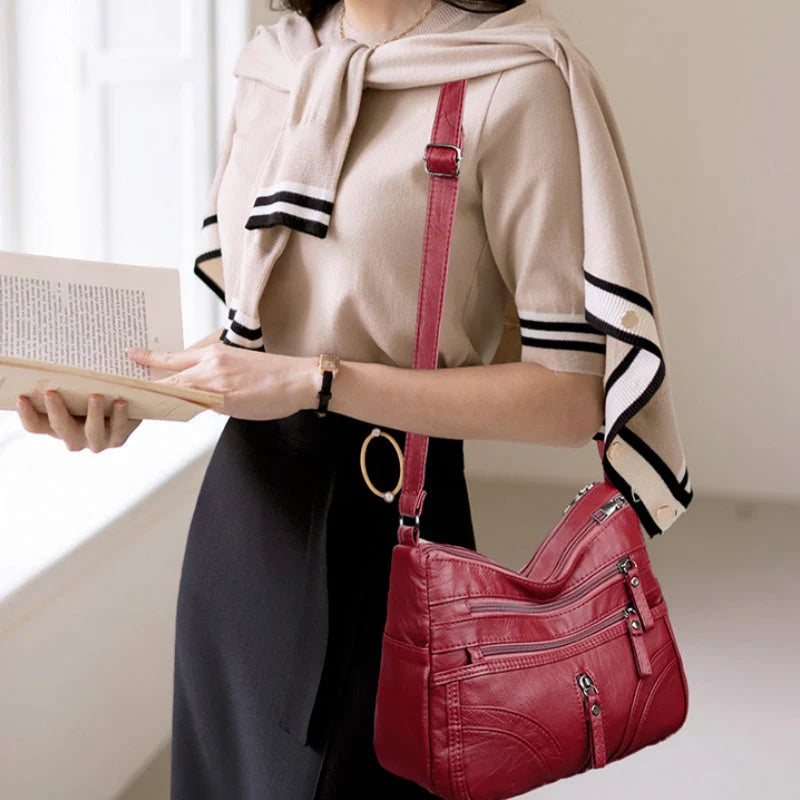 Clara - Bolso bandolera moderno con múltiples cremalleras y correa ajustable
