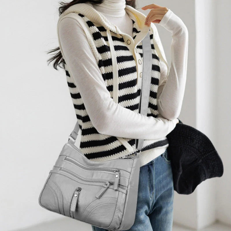 Clara - Bolso bandolera moderno con múltiples cremalleras y correa ajustable