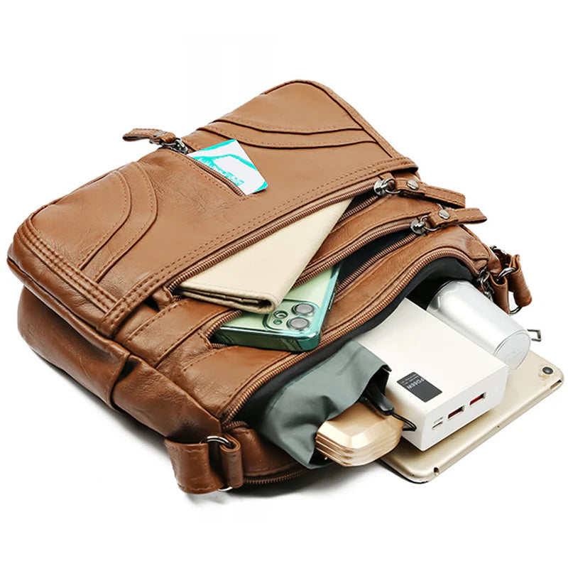 Clara - Bolso bandolera moderno con múltiples cremalleras y correa ajustable
