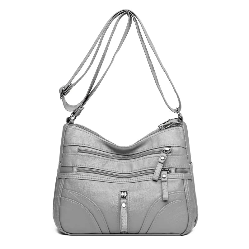 Clara - Bolso bandolera moderno con múltiples cremalleras y correa ajustable