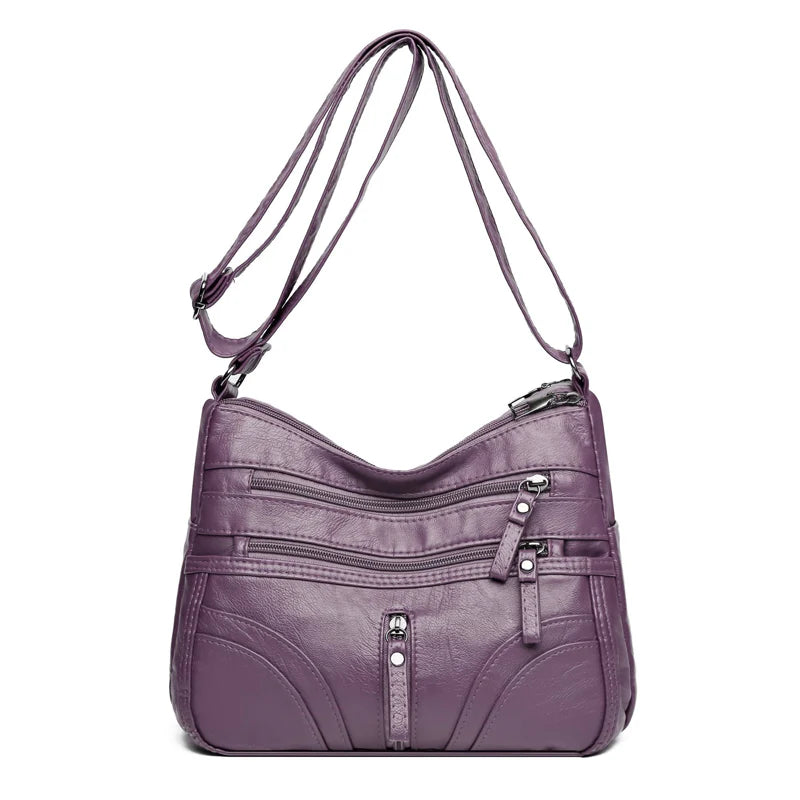 Clara - Bolso bandolera moderno con múltiples cremalleras y correa ajustable