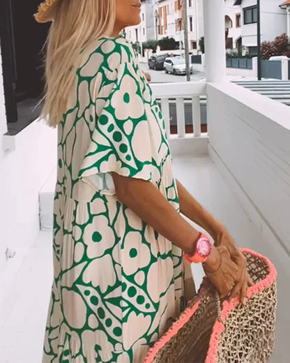 Cristina | Vestido largo de verano con corte fluido y elegante estampado gráfico