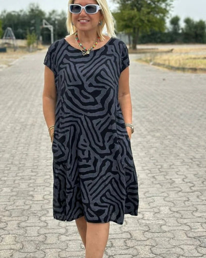 Nelia - Vestido fluido de verano con estampado abstracto y bolsillos