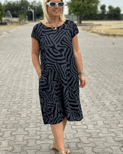Nelia - Vestido fluido de verano con estampado abstracto y bolsillos
