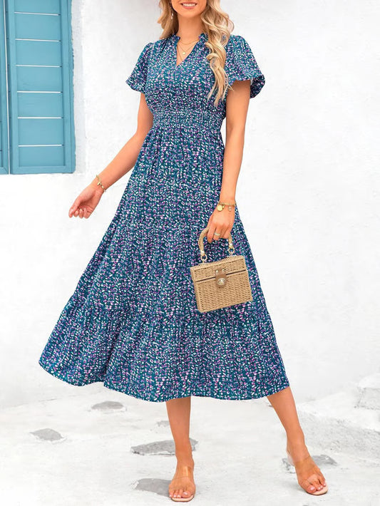 Mila - Vestido midi floral con cuello en V