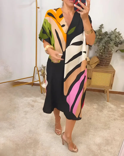 Rosa™ vestido fluido con estampado tropical y escote en pico