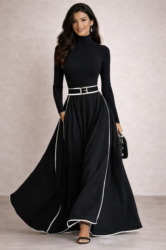 Adriana - Vestido largo negro con costuras blancas, cuello alto y cinturón ajustado