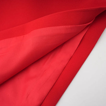 Ana – Vestido mini rojo con mangas pétalo y lazo