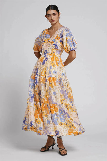 Cristina - Vestido maxi floral con manga abullonada