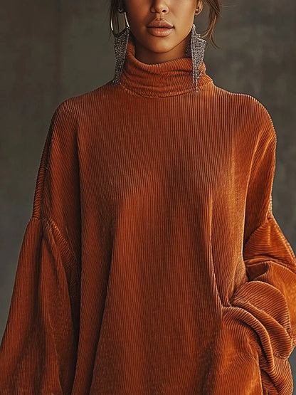 Valeria - Vestido de pana naranja con borlas