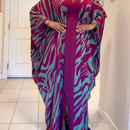 Verona - Vestido largo tipo túnica con mangas murciélago, cuello en V y estampado de cebra