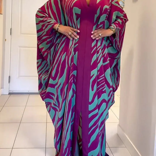 Verona - Vestido largo tipo túnica con mangas murciélago, cuello en V y estampado de cebra