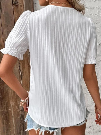 Pilar - Blusa plisada con encaje y manga abullonada