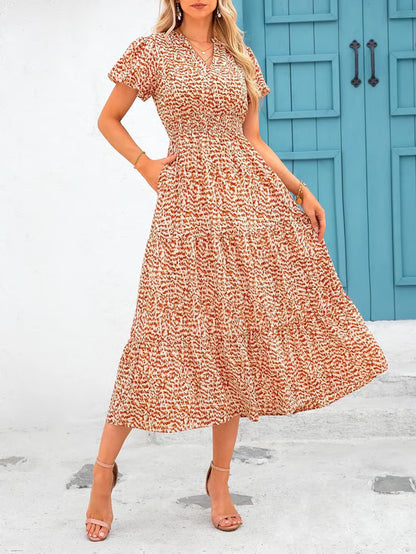 Mila - Vestido midi floral con cuello en V