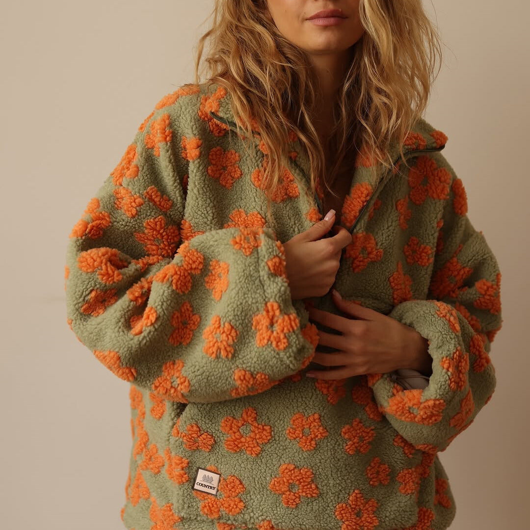 Daisy - Jersey oversize con estampado floral