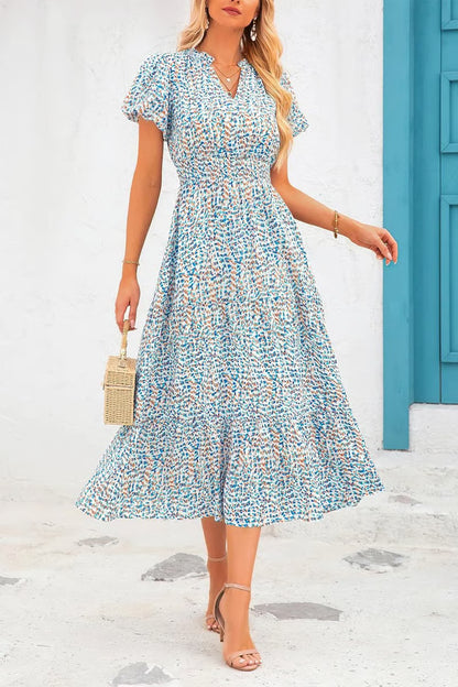 Mila - Vestido midi floral con cuello en V
