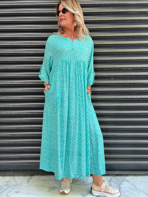 Coral™ | Vestido fluido con bolsillos y estampado discreto