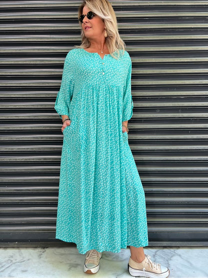 Coral™ | Vestido fluido con bolsillos y estampado discreto