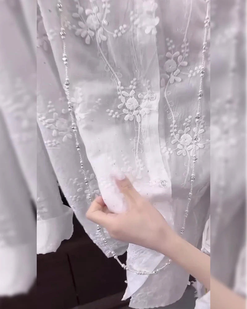 Emilia – Blusa bordada elegante