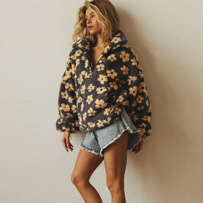 Daisy - Jersey oversize con estampado floral