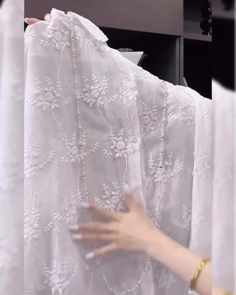 Emilia – Blusa bordada elegante