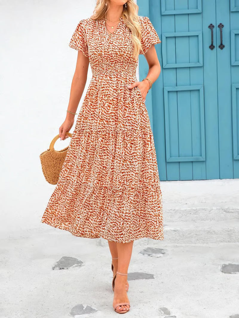Mila - Vestido midi floral con cuello en V