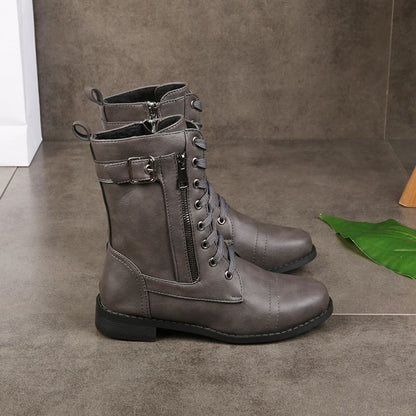 Botas de punta redonda con cremallera lateral fabricadas en piel