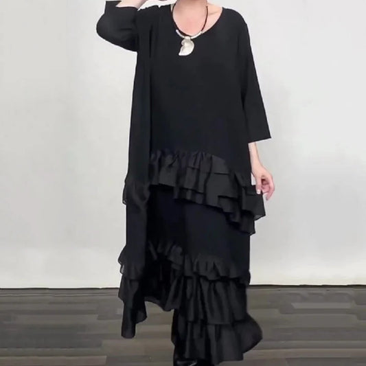 Eva – Vestido oversize fluido con volantes y capas