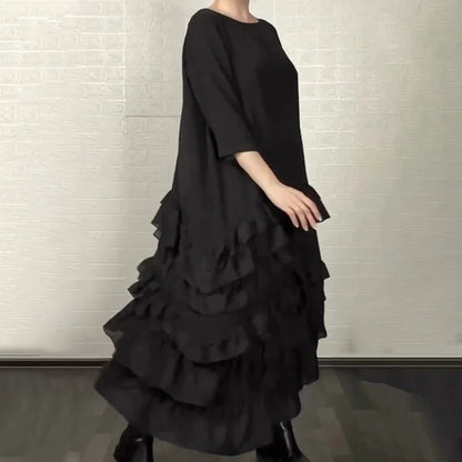 Eva – Vestido oversize fluido con volantes y capas