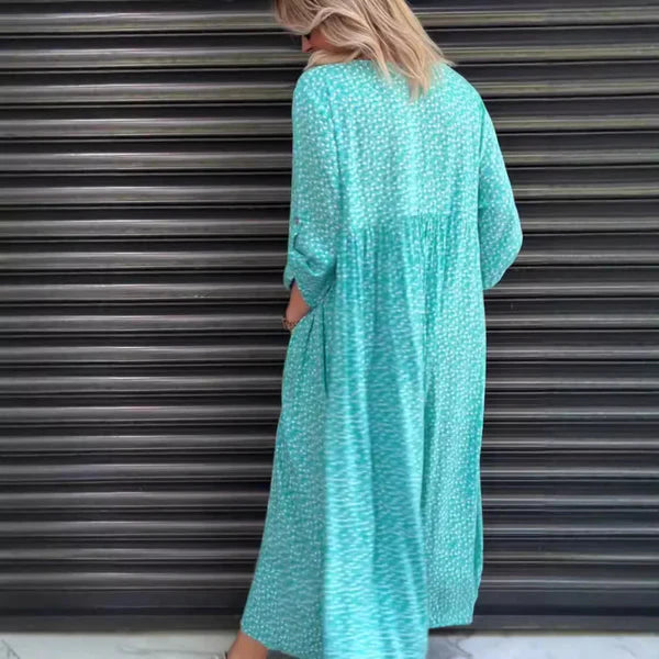 Coral™ | Vestido fluido con bolsillos y estampado discreto