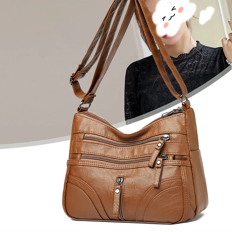 Clara - Bolso bandolera moderno con múltiples cremalleras y correa ajustable