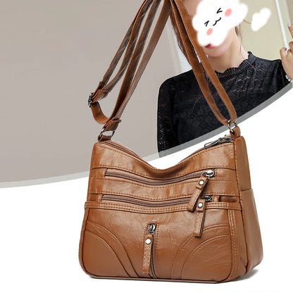 Clara - Bolso bandolera moderno con múltiples cremalleras y correa ajustable
