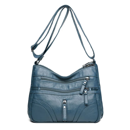 Clara - Bolso bandolera moderno con múltiples cremalleras y correa ajustable