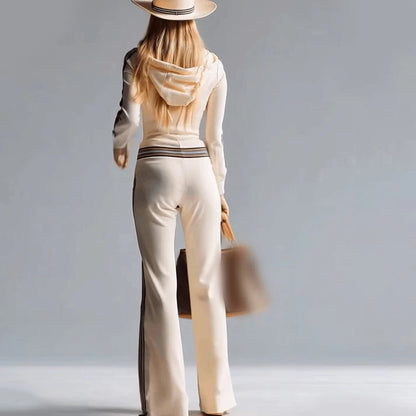 Isabella – Mono de punto canalé con capucha y cremallera